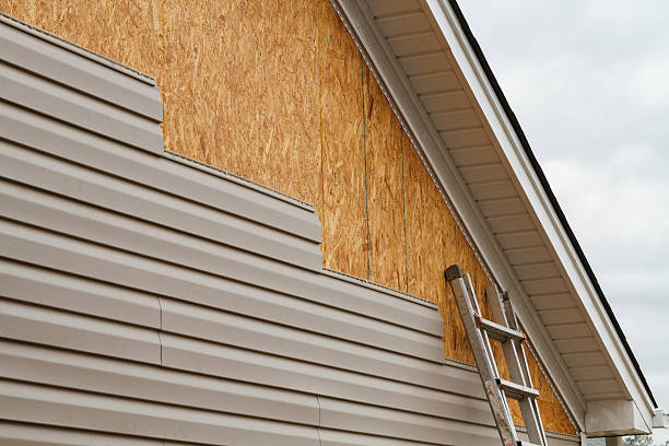 Professional Emergency Siding Repair technician working in Ferndale, MD